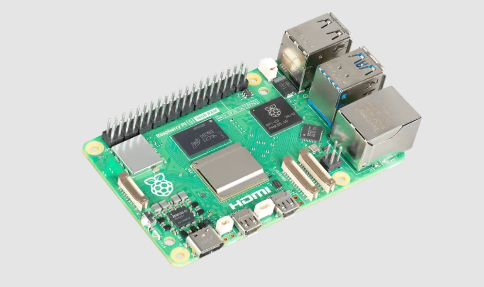 Raspberry Pi 5 board showing 40-pin GPIO header camera display connectors USB ports Ethernet and mounting positions for compatibility review